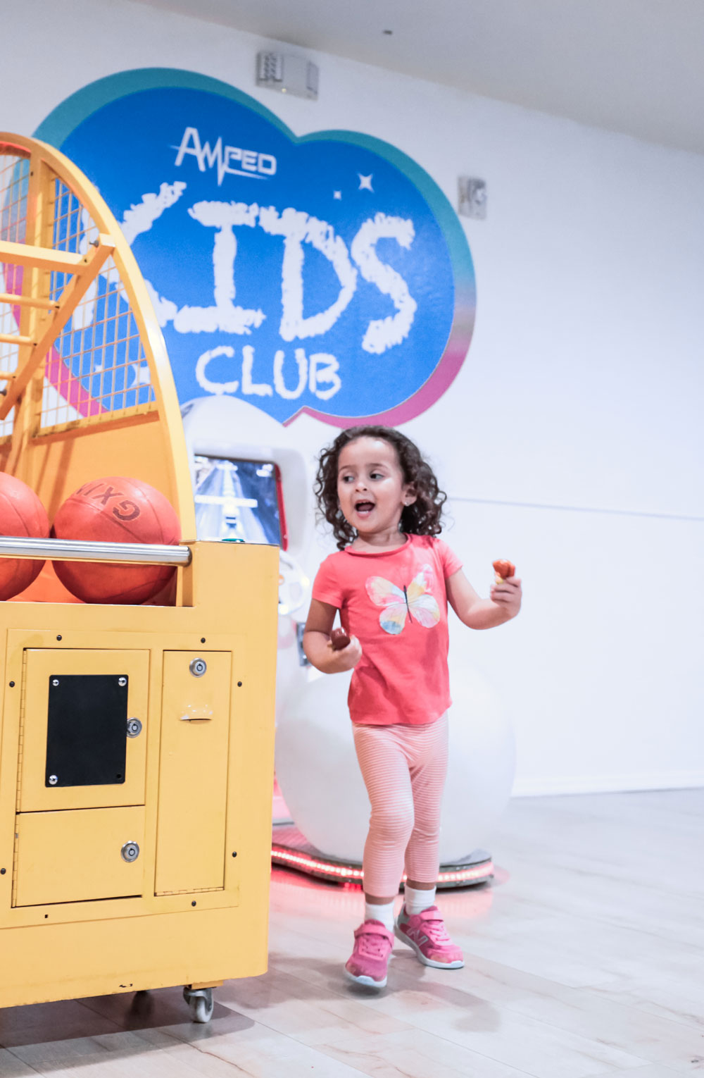 A child playing in the Amped Fitness Kids Club